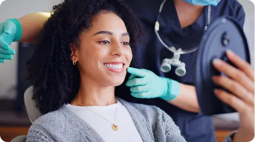 Dental check-up with mirror inspection
